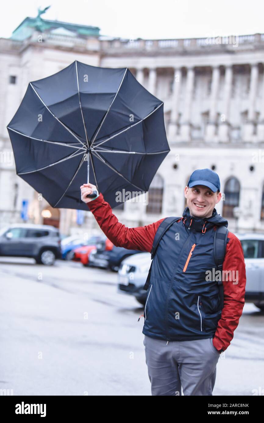 Strong wind rain umbrella hi-res stock photography and images - Alamy