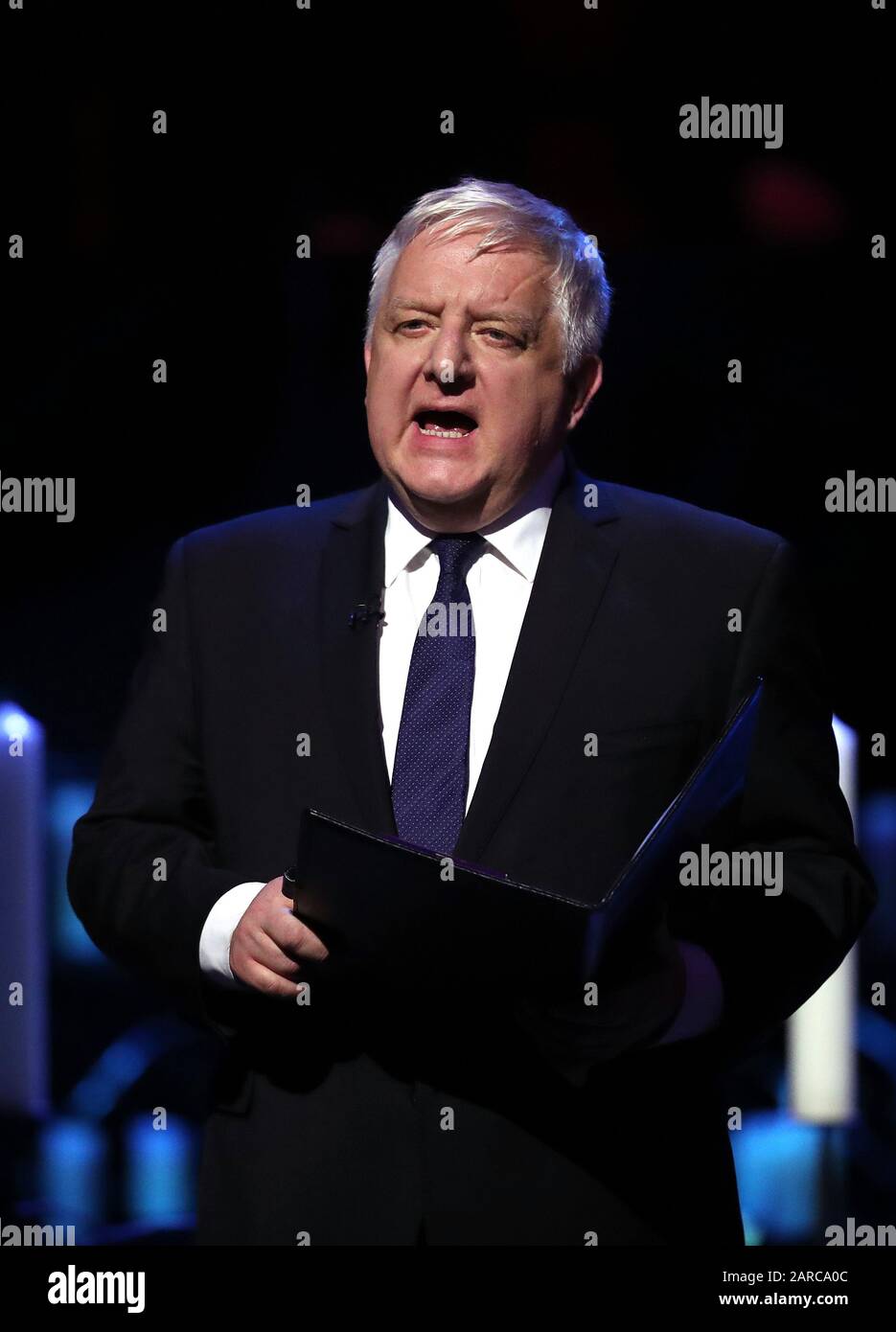 Sir Simon Russell Beale reading during the UK Holocaust Memorial Day Commemorative Ceremony at Central Hall in Westminster, London. Stock Photo