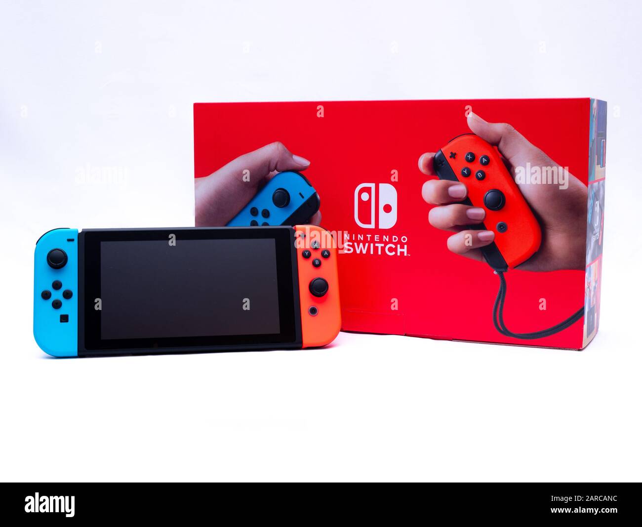 UK, Jan 2020: Nintendo switch console and home dock on white background  with box Stock Photo - Alamy