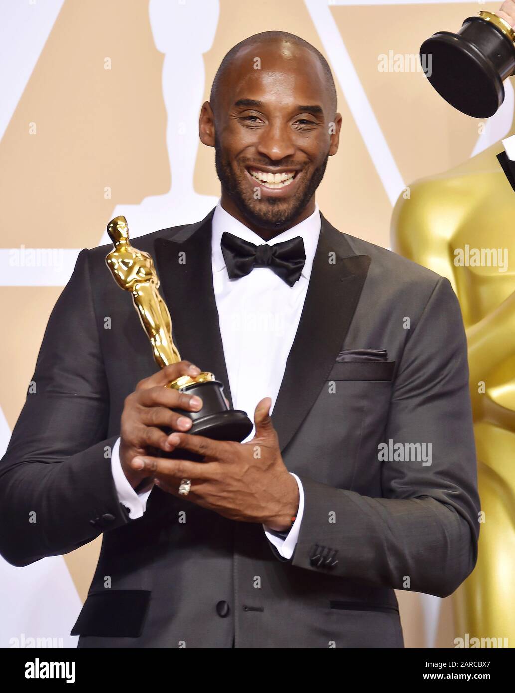 HOLLYWOOD, CA - MARCH 04: Filmmaker Kobe Bryant poses in the press room during the 90th Annual Academy Awards at Hollywood & Highland Center on March 4, 2018 in Hollywood, California. Stock Photo