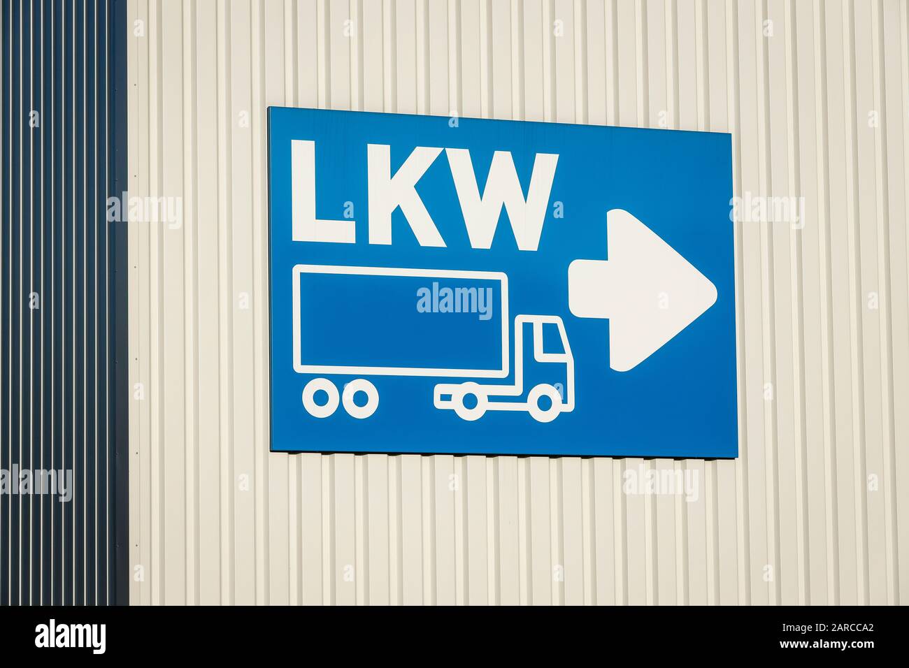 Germany - Truck delivery, sign at a logistics centre. Deutschland - LKW-Anlieferung, Schild an einem Logistikzentrum. Stock Photo