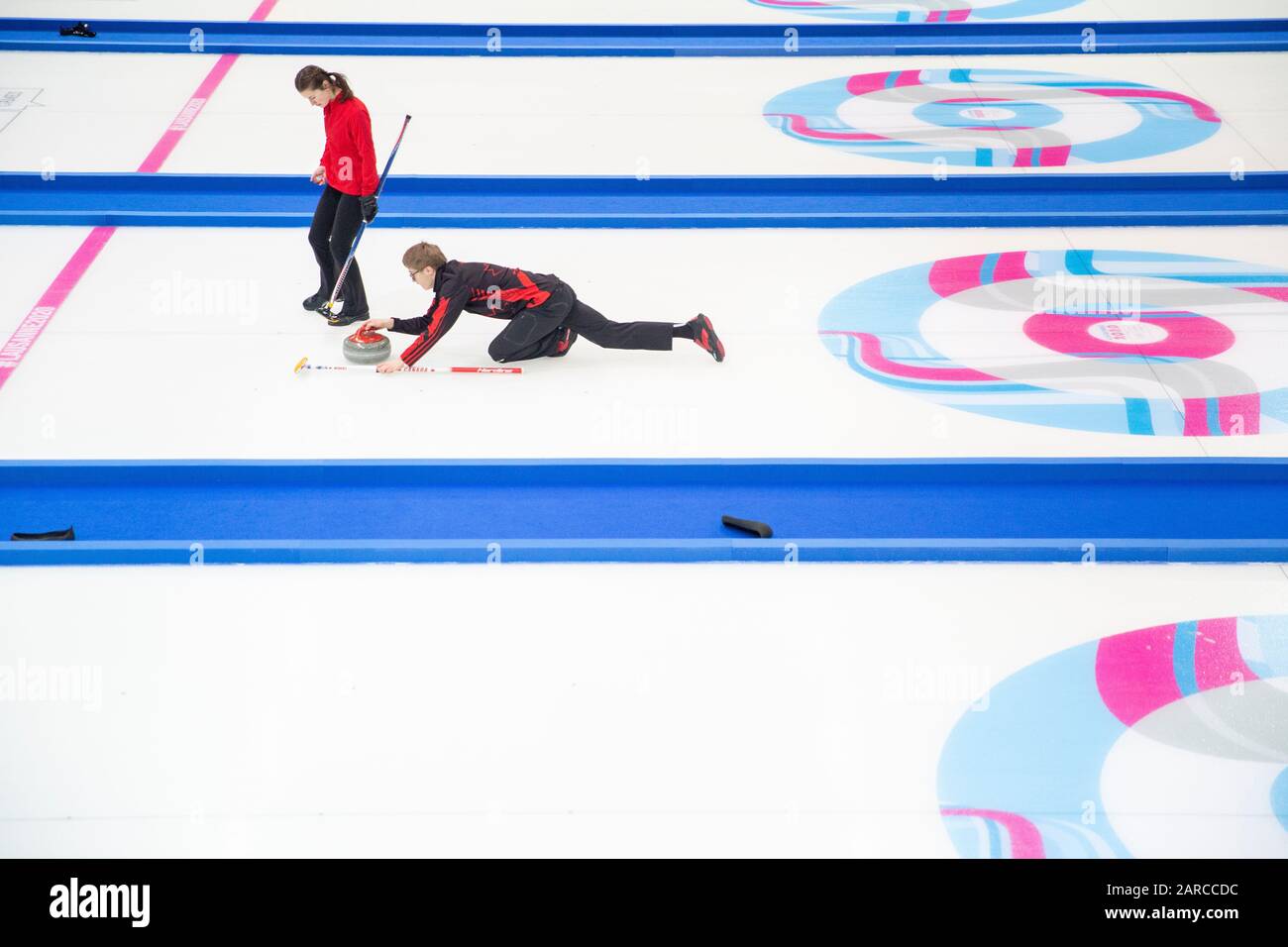 Canada play the Team USA in the NOC Curling mixed doubles at the Lausanne 2020 Youth Olympic Games on the 20th January 2020 at Champery Curling Arena Stock Photo