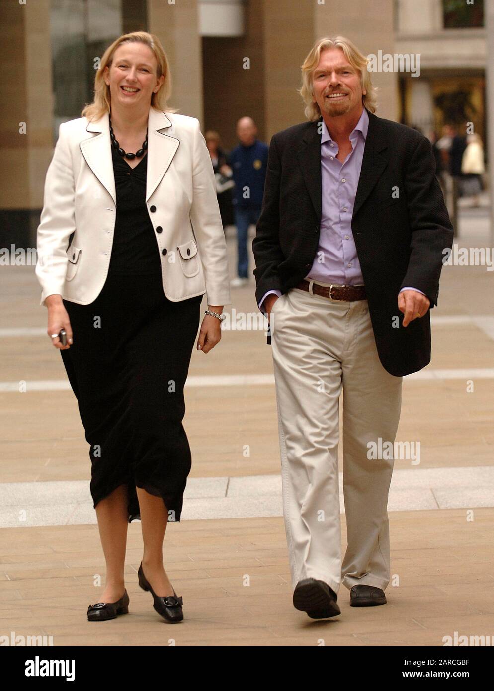 Jayne-Anne Gadhia CEO of Virgin money and Sir Richard Branson outside the Stock Exchange in London after announcing a deal involving Northern Rock building society in 2007. Stock Photo