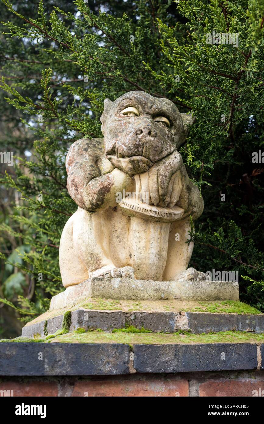 Stone gatepost pillar gargoyle statue on residence at Stratford on Avon