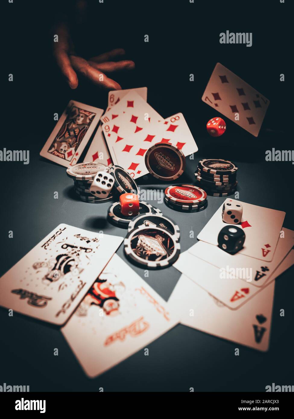 Cards, fiches and dices for a creative casino shoot Stock Photo