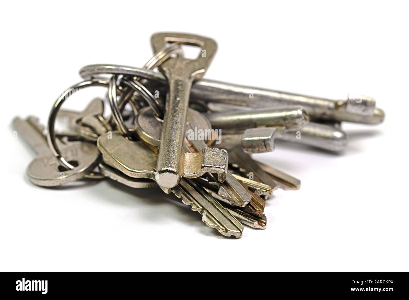 Bunch of keys isolated against white background Stock Photo
