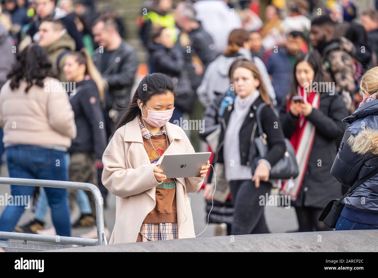 Download London January 26 2020 Chinese Women Wearing Face Mask Using Tablet At London Busy Street Stock Photo Alamy PSD Mockup Templates