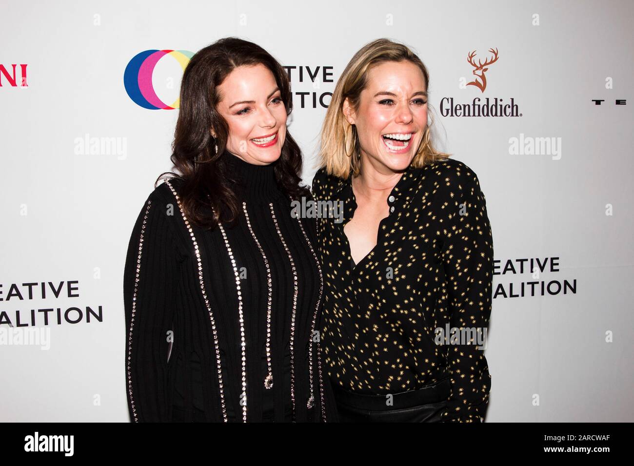 L-R) Kimberly Williams-Paisley and sister Ashley Williams attend