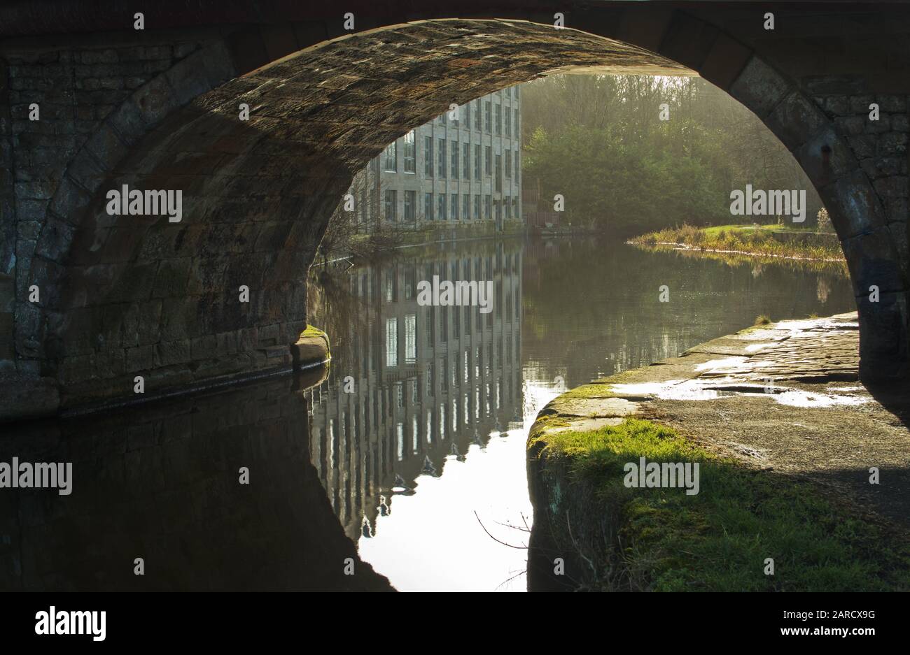 A hazy appearance caused by back-lighting on the Leeds and Liverpool canal, Brierfield, Lancashire, England Stock Photo