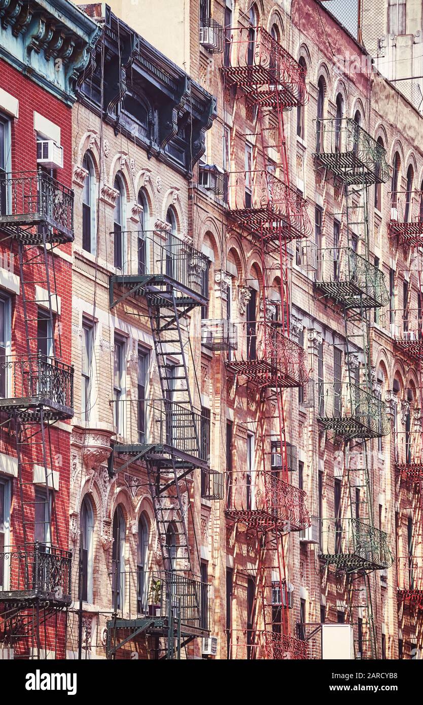 Manhattan old residential buildings with fire escapes, New York City ...