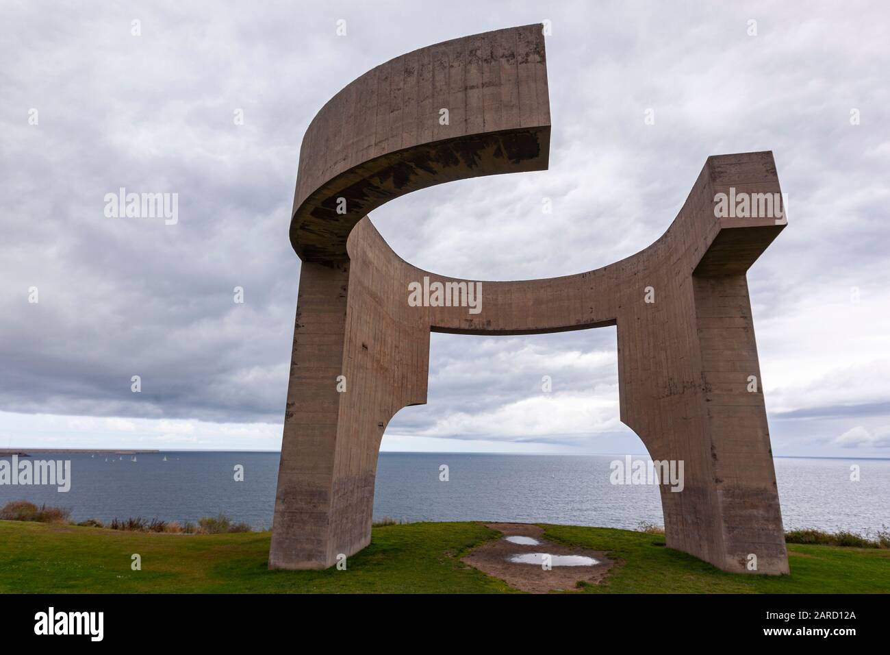 Elogio del Horizonte,  sea-facing concrete sculpture by Basque artist Eduardo Chillida, Gijon, Asturias, Spain Stock Photo