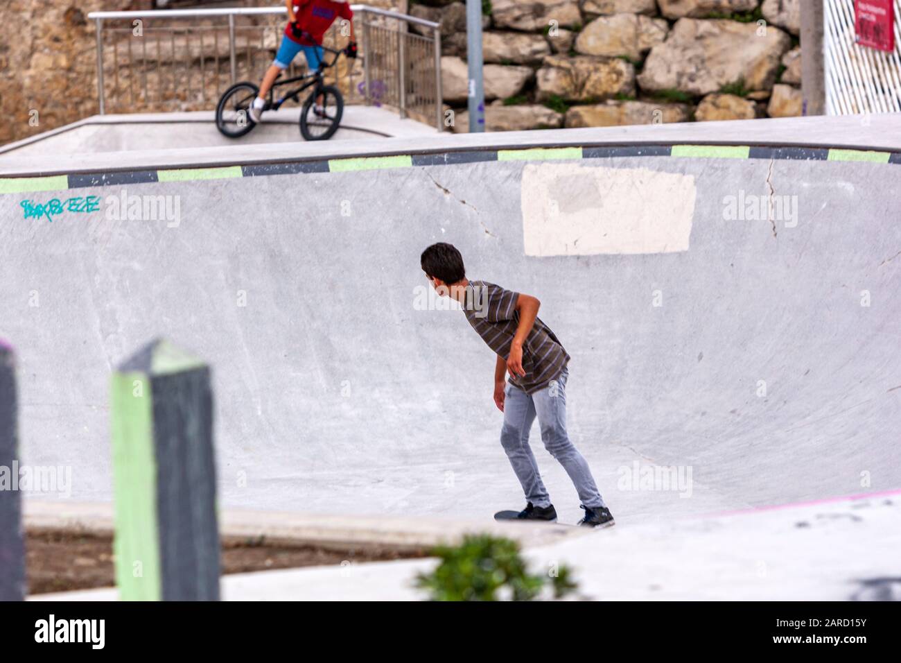 Young boy practising skateboard in La Pista Skate, Gijon, Asturias, Spain  Stock Photo - Alamy