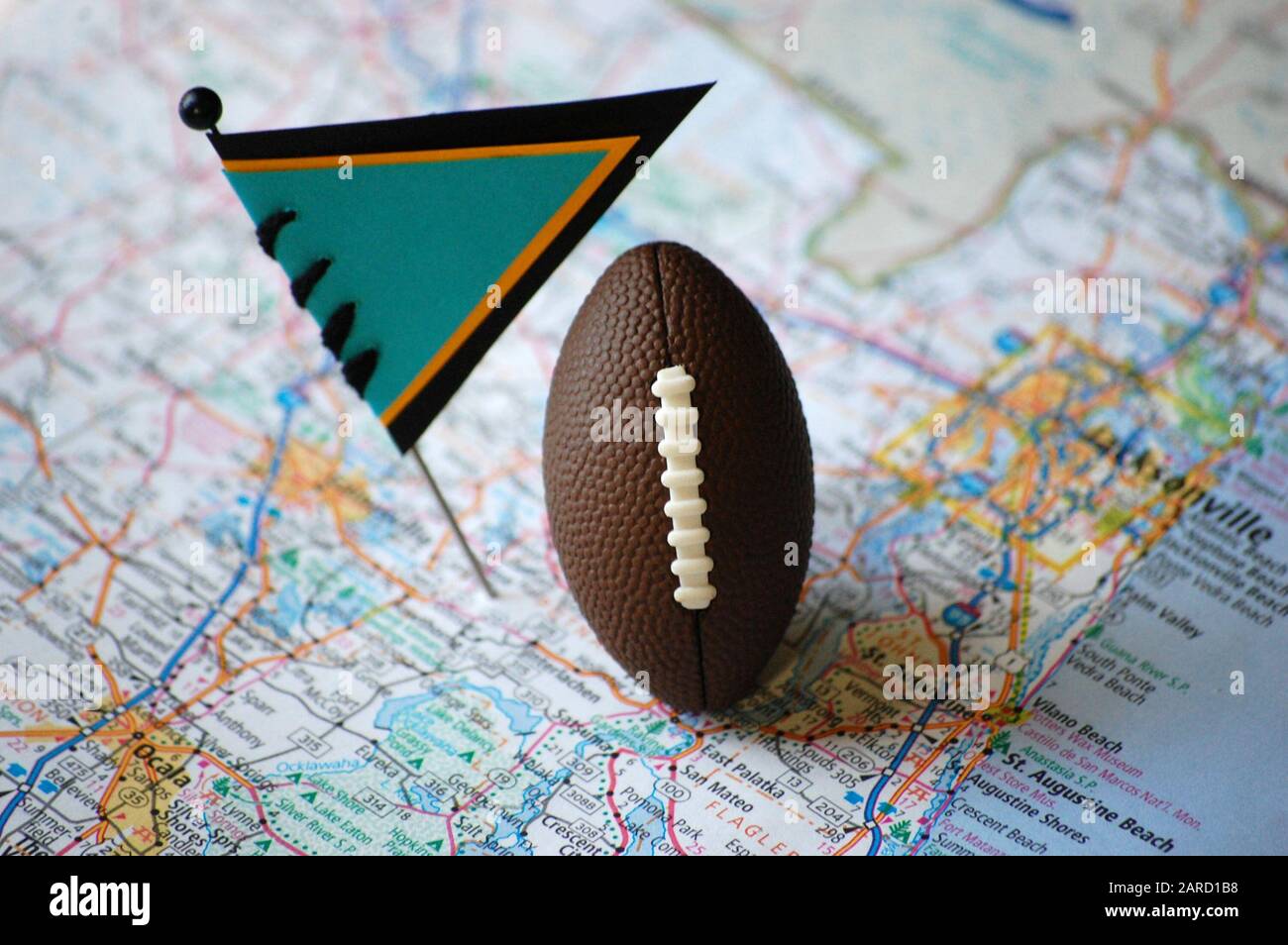 A map of Jacksonville, Florida marked with a flag pin and a football