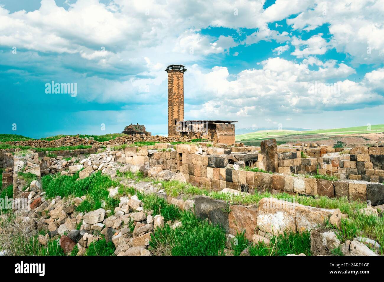 Famous Ani Ruins with old mosque tower standing. Ani was one of the biggest cities in medieval Armenia but now is just ruined and uninhabited site wit Stock Photo