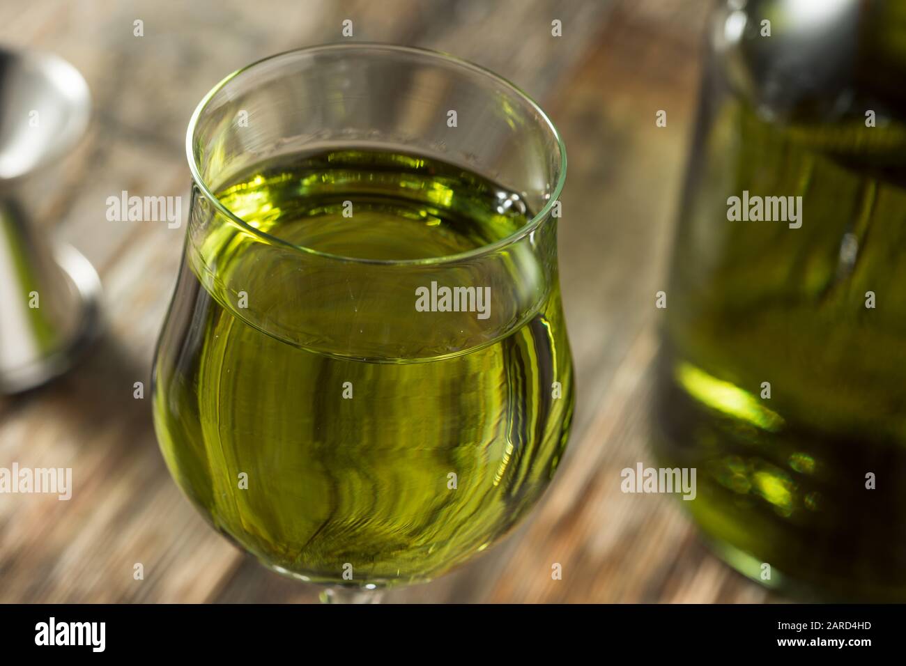 Organic Green Chartreuese Liqueur in a Glass Stock Photo