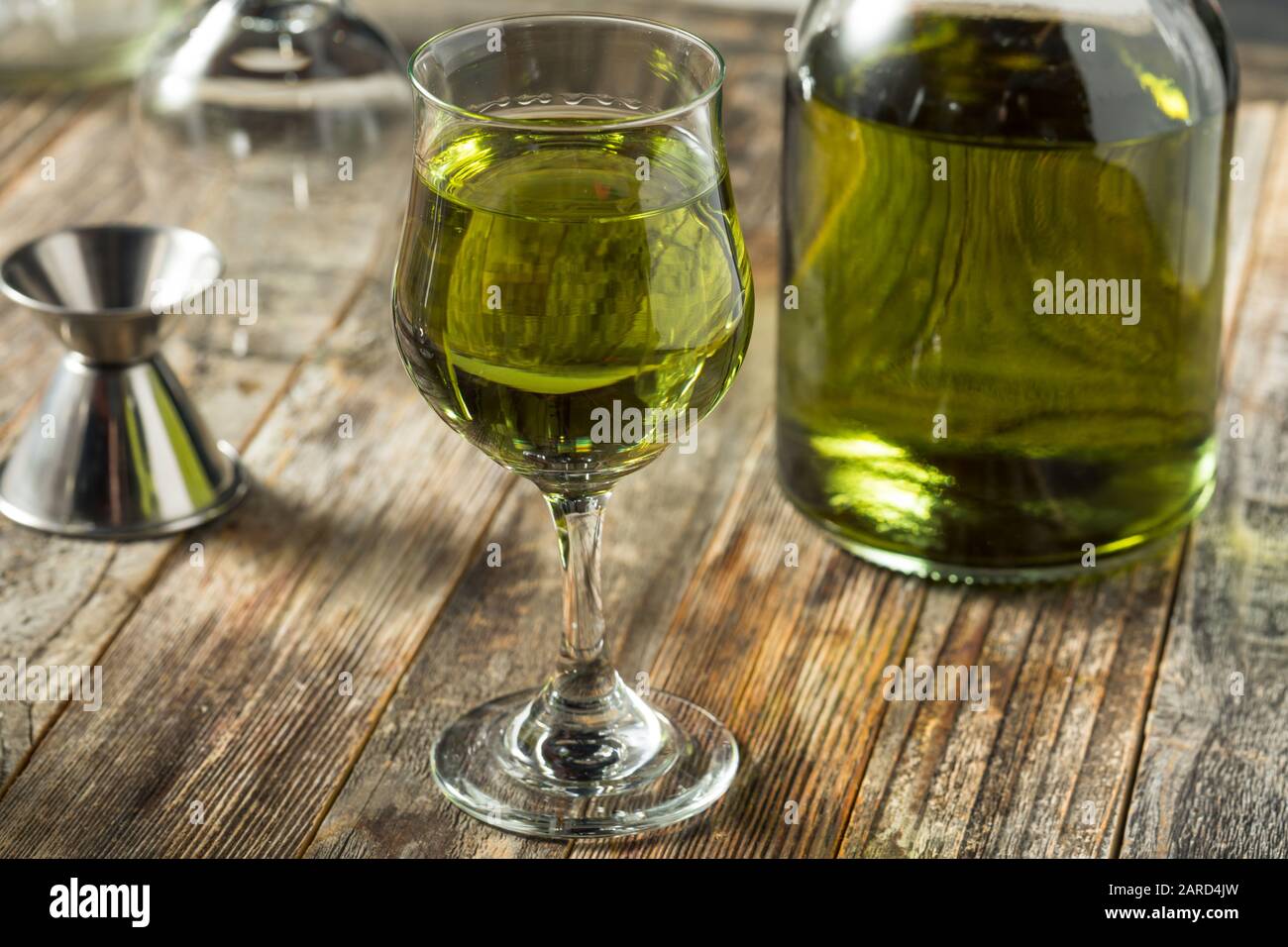 Organic Green Chartreuese Liqueur in a Glass Stock Photo