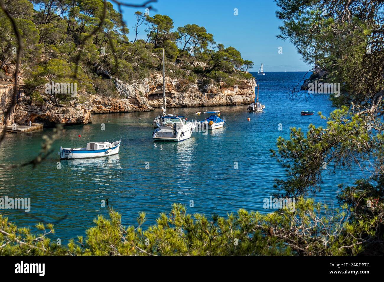 Anchoring sailing boats and motorboats in picturesque bay Cala Figuera, Santanyí, Mallorca, Balearic Islands, Spain, Europe Stock Photo