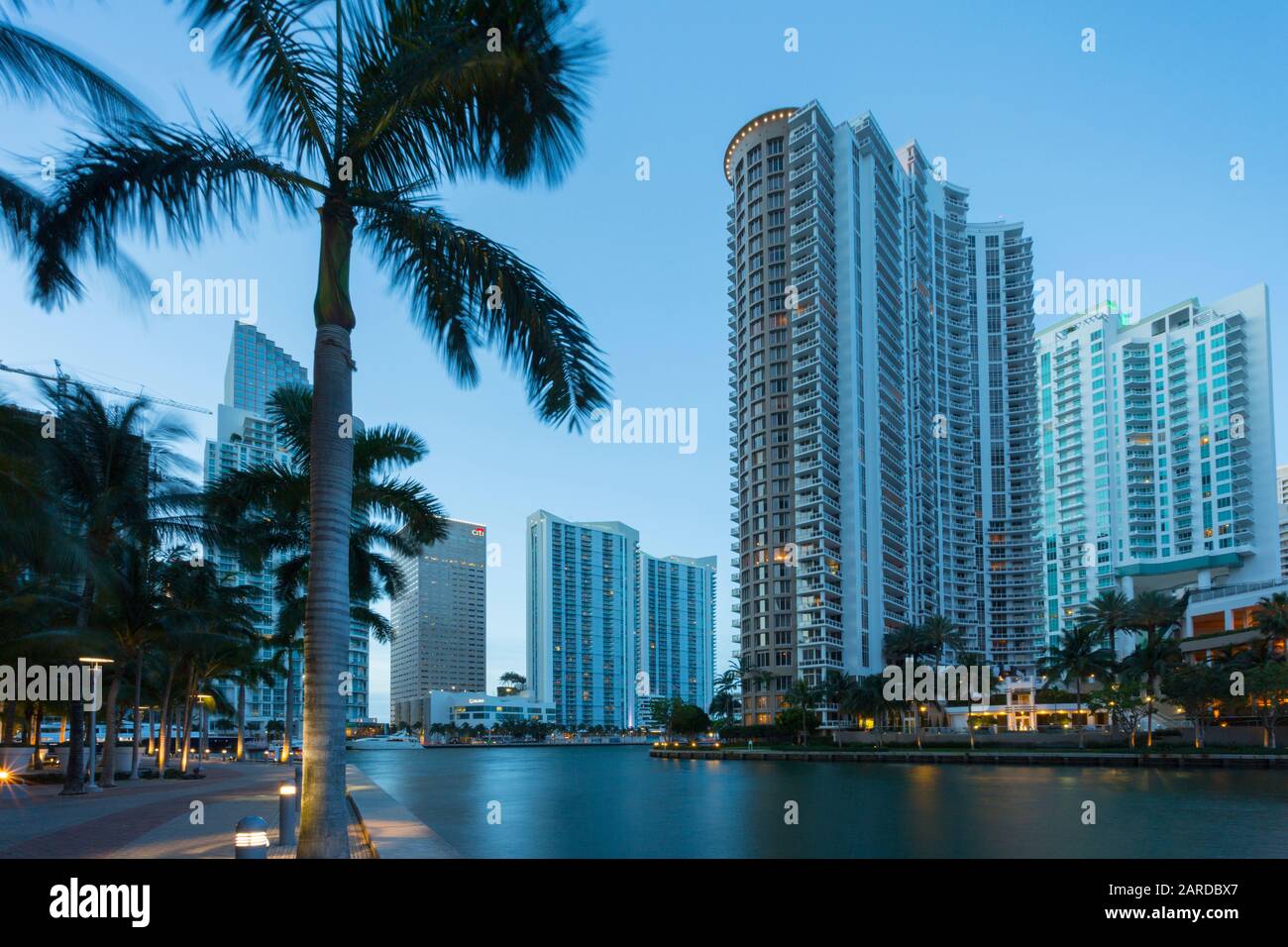 City skyscrapers and Brickell Key at dusk in Downtown Miami, Miami, Florida, United States of America, North America Stock Photo