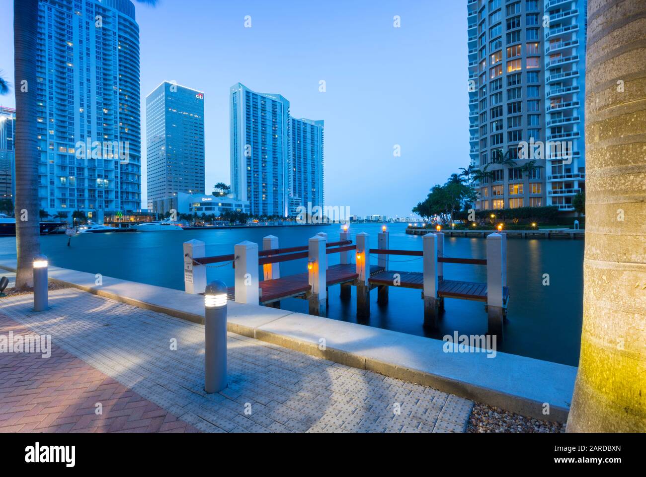 City skyscrapers and Brickell Key at dusk in Downtown Miami, Miami, Florida, United States of America, North America Stock Photo