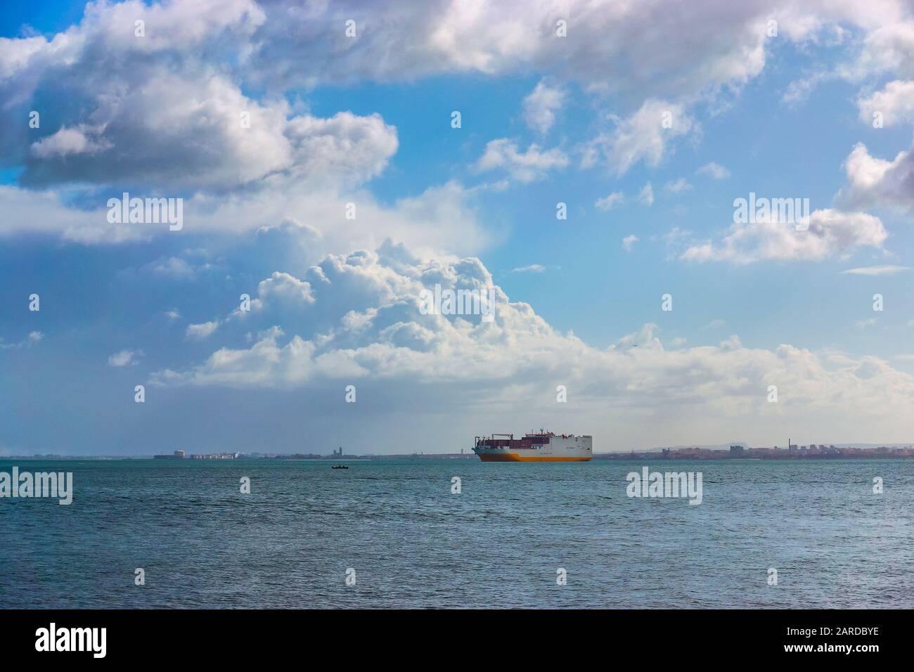 Cargo container Ship arriving into River Tagus Lisbon Port, Portugal ...