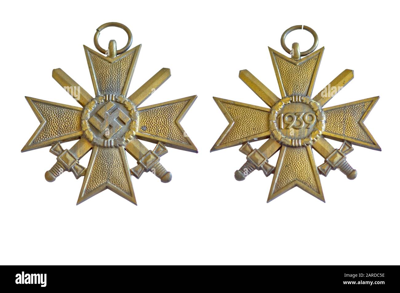 An old World War 2 Nazi Merit Medallion, circa 1939. Isolated on white background with both sides shown in one composite image. My brother acquired th Stock Photo