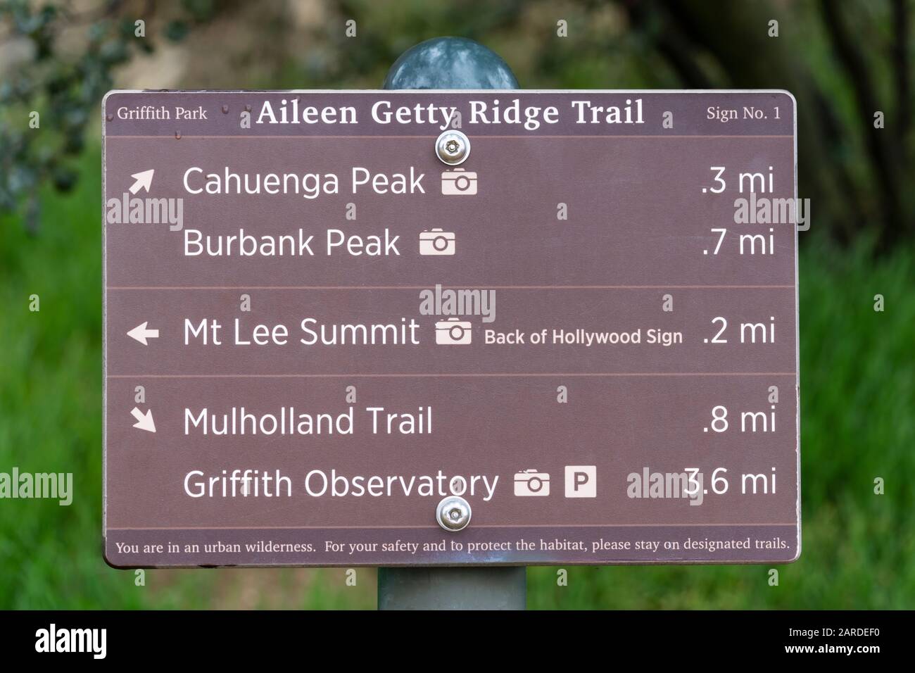 Los Angeles, California, USA - January 26, 2020:  Hiking trail sign to Griffith Observatory, Burbank Peak, Cahuenga Peak, Mt Lee and the back of the H Stock Photo