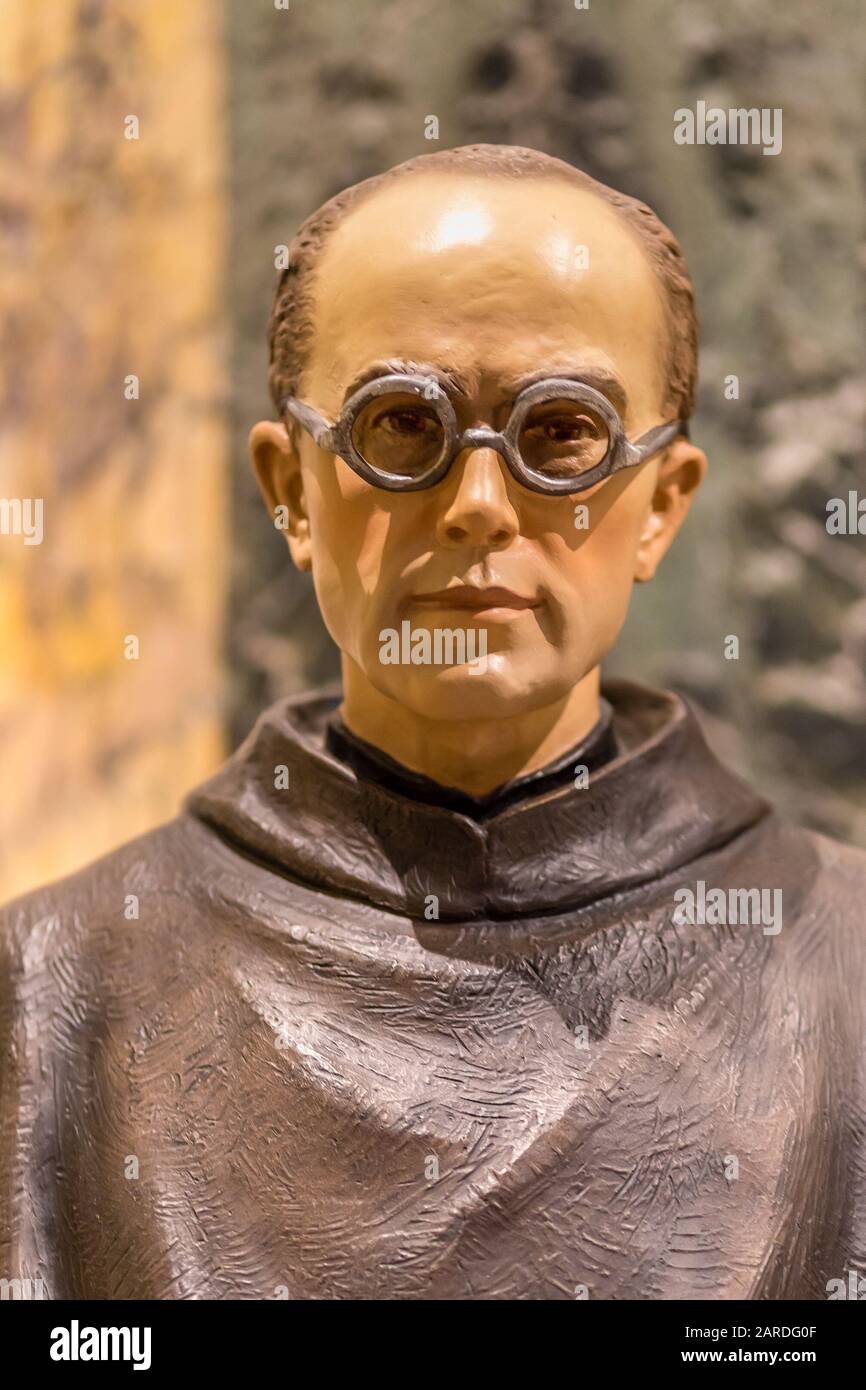 RAVENNA, ITALY - MAY 2, 2019: light is enlightening the statue of Saint Maximilian Kolbe Stock Photo