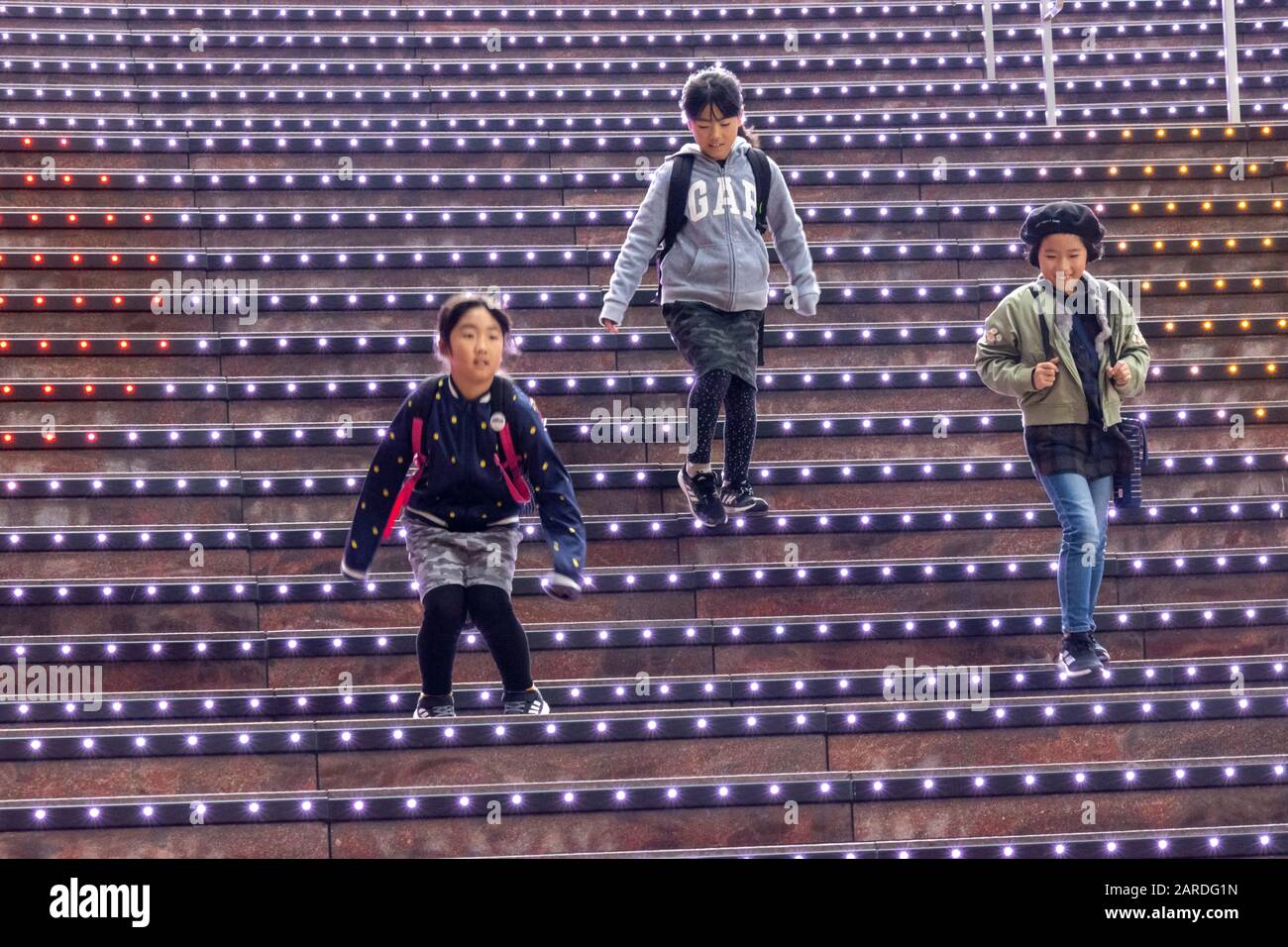 Children playing on stairs hi-res stock photography and images - Alamy