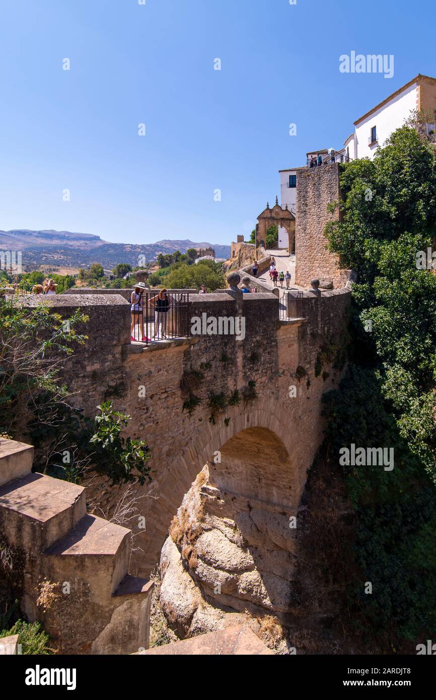 Ronda, Spain 08/17/2019; The Old Bridge was built in 1616, crosses the Guadalevin river, is 10 meters long and has a height of 30 meters. Stock Photo