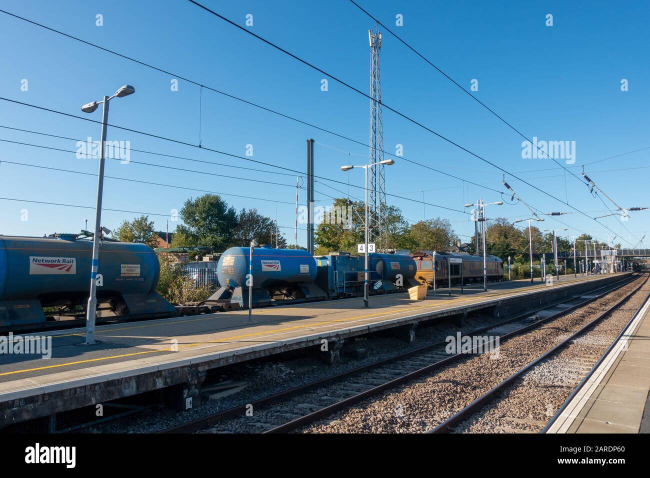 Freight train passing through Biggleswade Railway Station, Bedfordshire