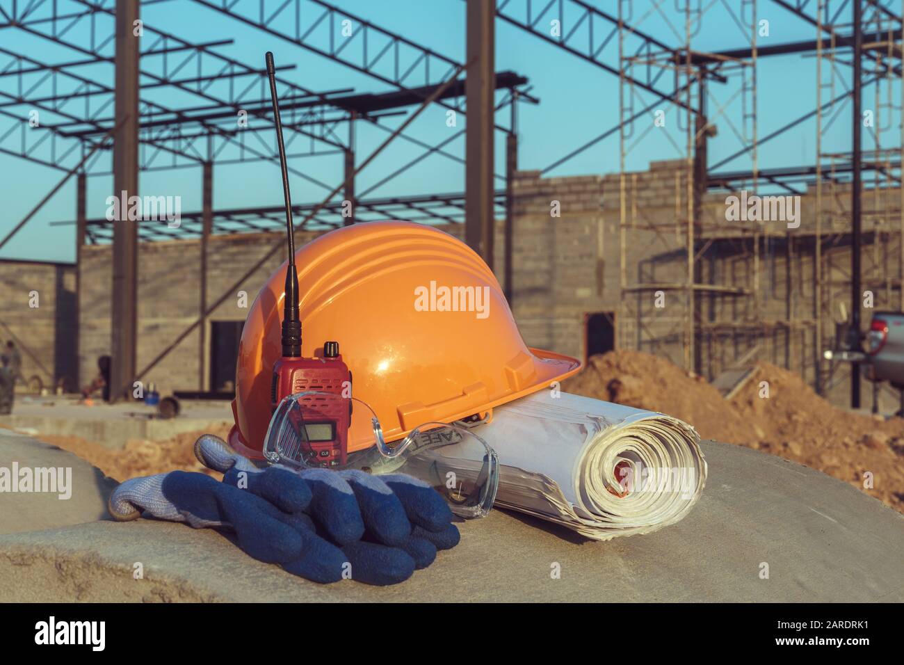 Engineer Safety Communication Safety helmets, radio communications, and blueprints of engineers Stock ...