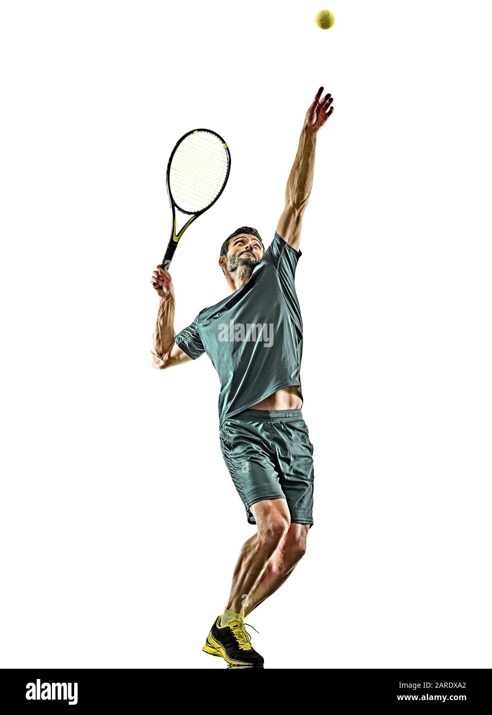 one caucasian mature tennis player man serving service  in studio isolated on white background Stock Photo