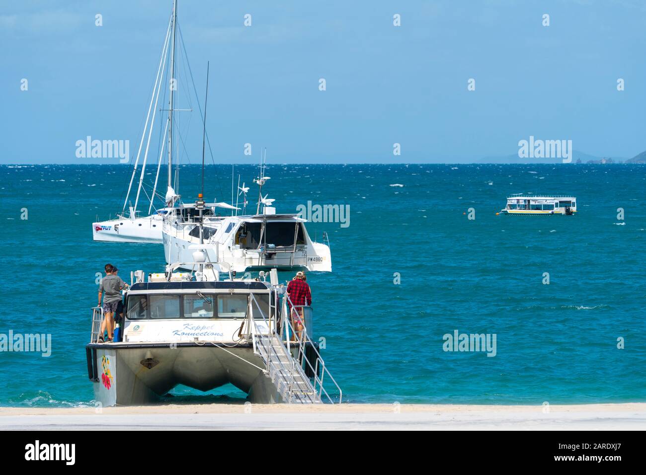 Island ferry loading tourist from beach at Great Keppel Island