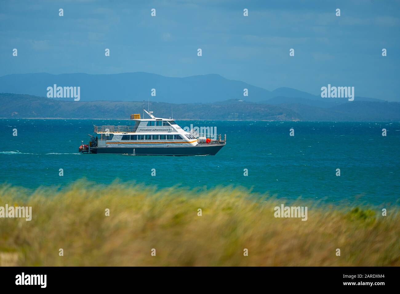 Island ferry loading tourist from beach at Great Keppel Island