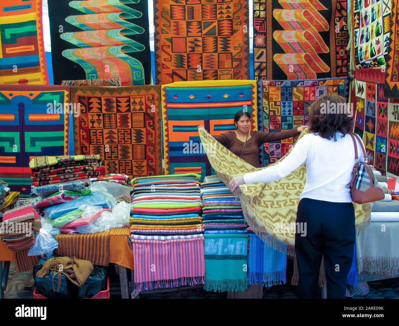 Rug seller Pisac, Peru Stock Photo