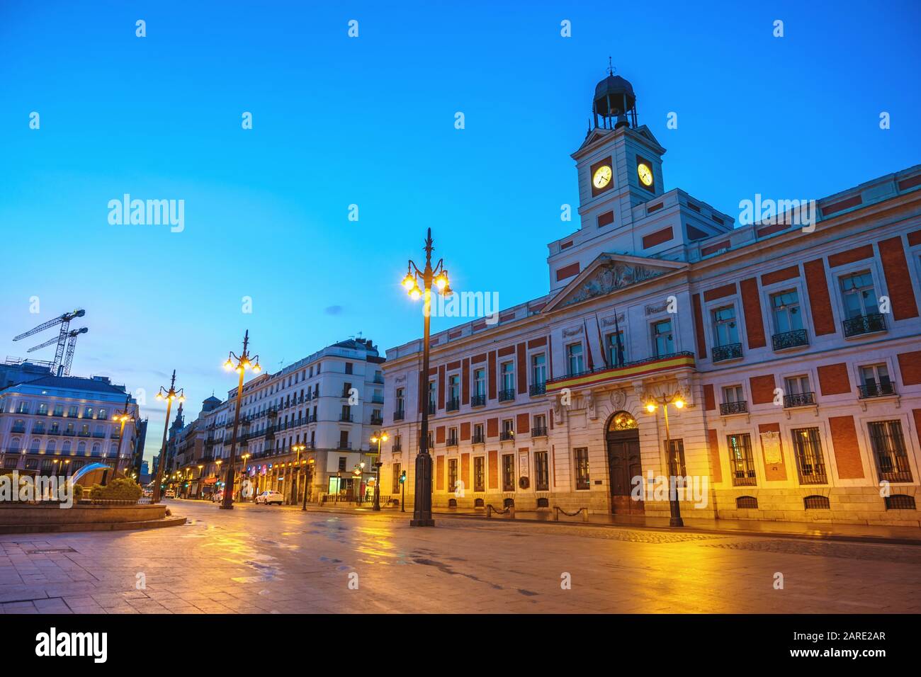 Madrid Spain, night city skyline at Puerta del Sol and Clock Tower of Sun Gate Stock Photo