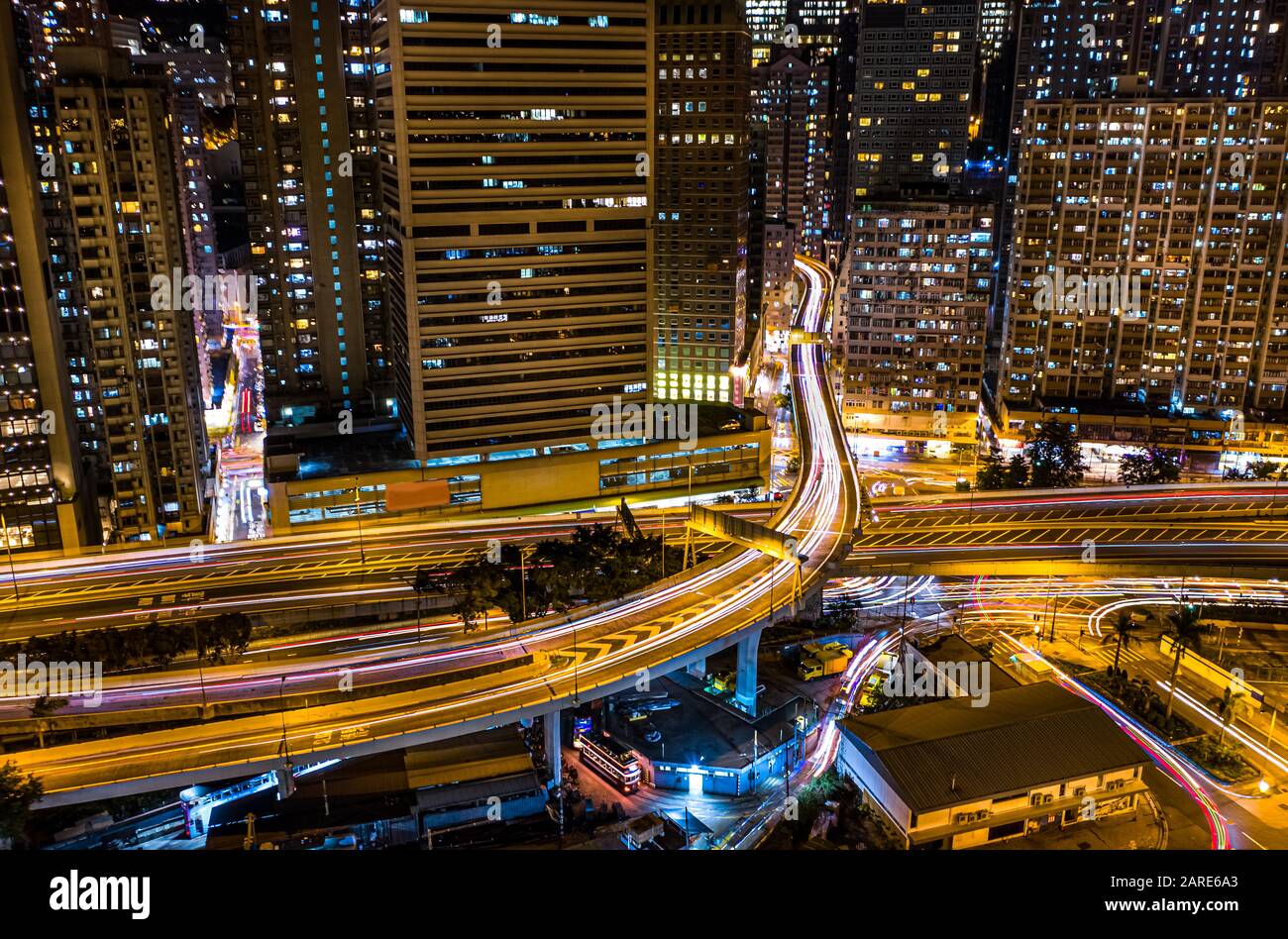 Aerial view of city at night with Light Track Stock Photo - Alamy