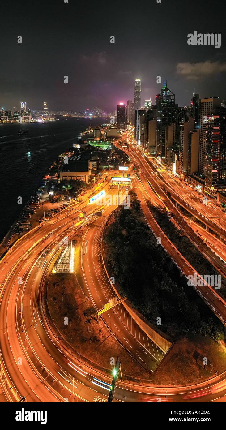 Aerial view of city at night with Light Track Stock Photo - Alamy