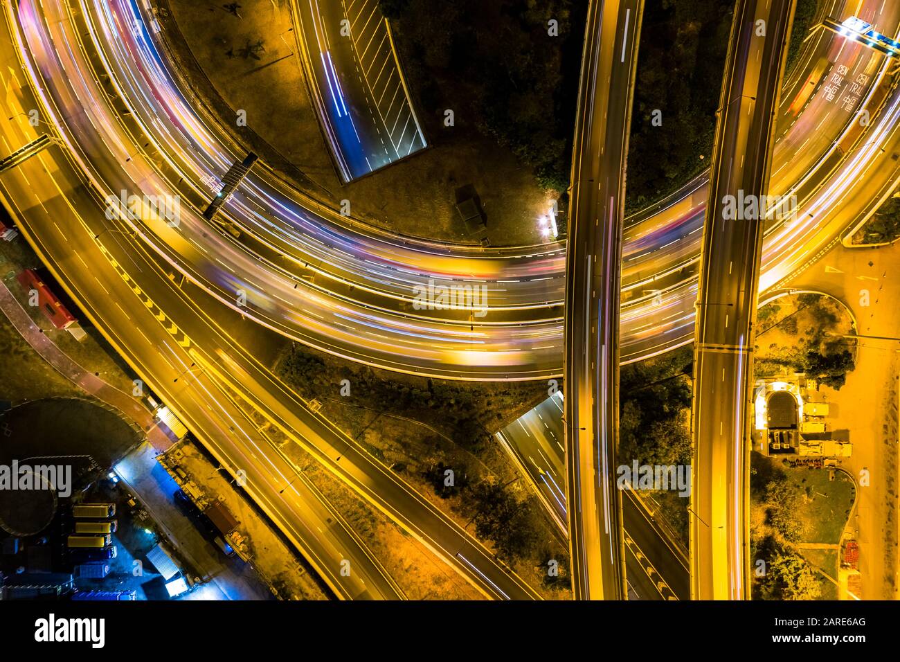 Aerial view of city at night with Light Track Stock Photo - Alamy