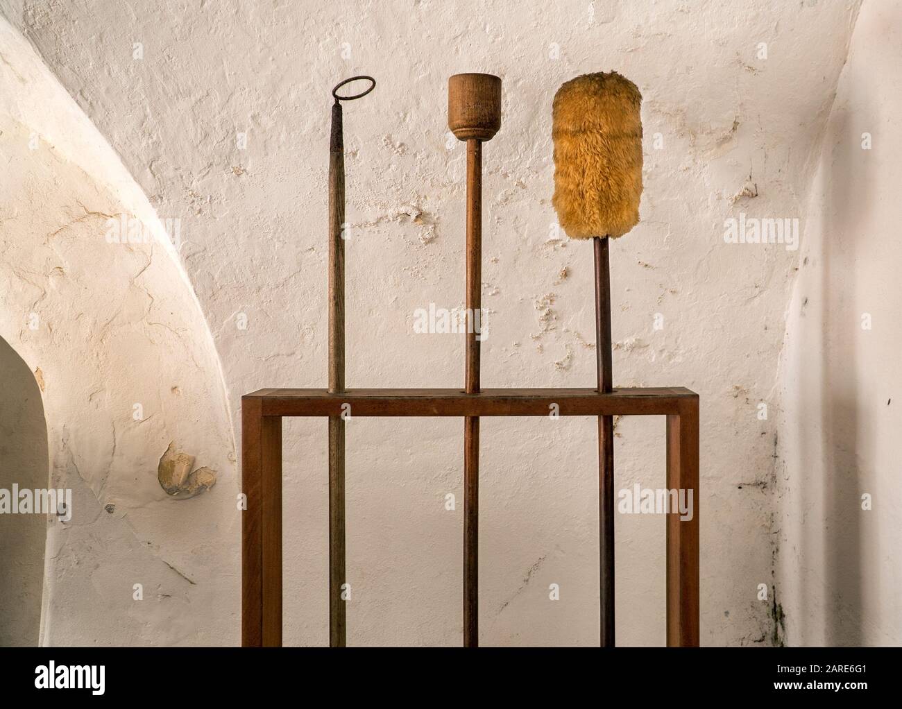 Cannon Tools on display. Tool on the right is a sponge rammer Stock Photo -  Alamy