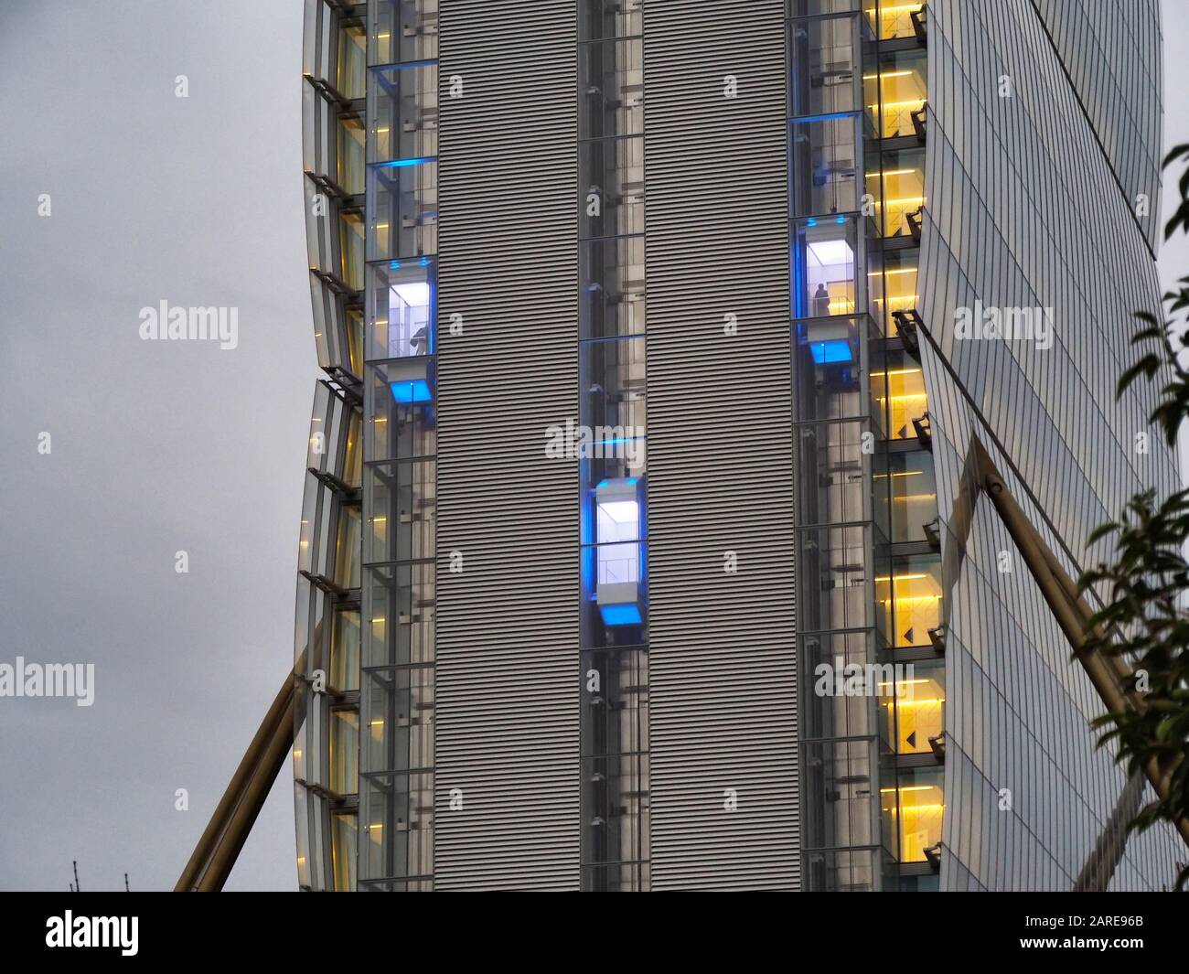 Moving outdoor glass elevators of a modern building Stock Photo Alamy