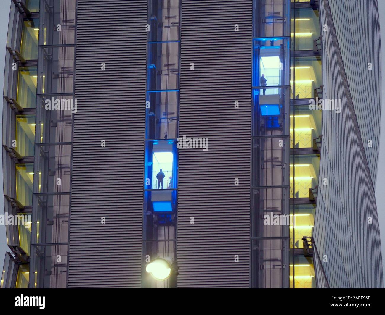 Moving outdoor glass elevators of a modern building Stock Photo Alamy