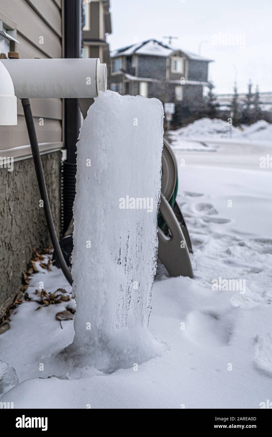 Furnace exhaust vent with Icicle from dripping water Stock Photo Alamy