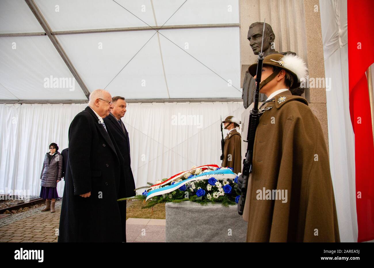 Oswiecim, Poland. 27th Jan, 2020. President of the Republic of Poland Andrzej Duda and the President of Israel Reuwen Riwlin lay flowers at the Monument of Captain Witold Pilecki during the 75th anniversary of the liberation of KL Auschwitz-Birkenau. Credit: SOPA Images Limited/Alamy Live News Stock Photo
