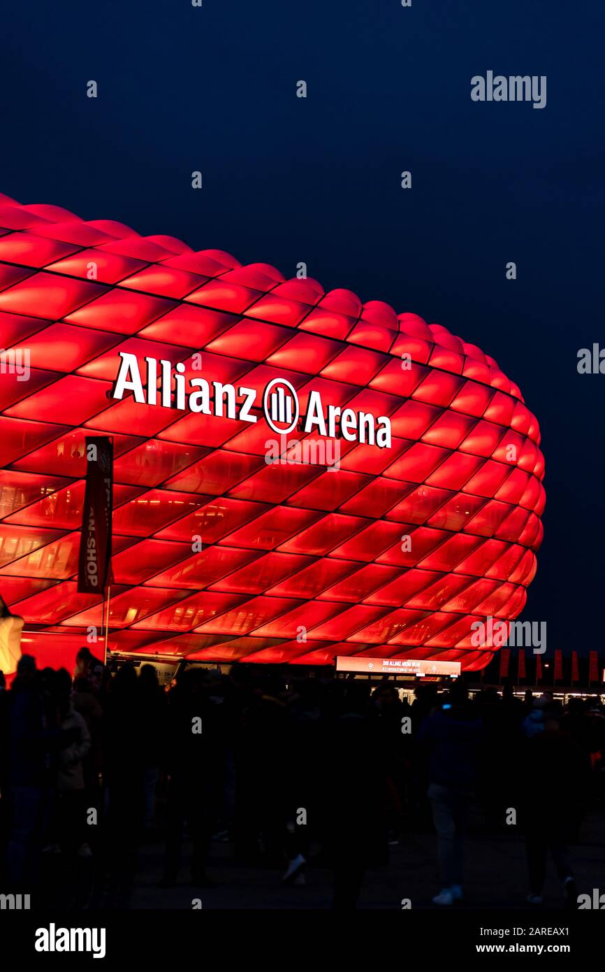 MUNICH, GERMANY - Jan 25, 2020: Illuminated arena of german football club  FC Bayern München. Red light of Allianz Arena with fans walking to see the  m Stock Photo - Alamy