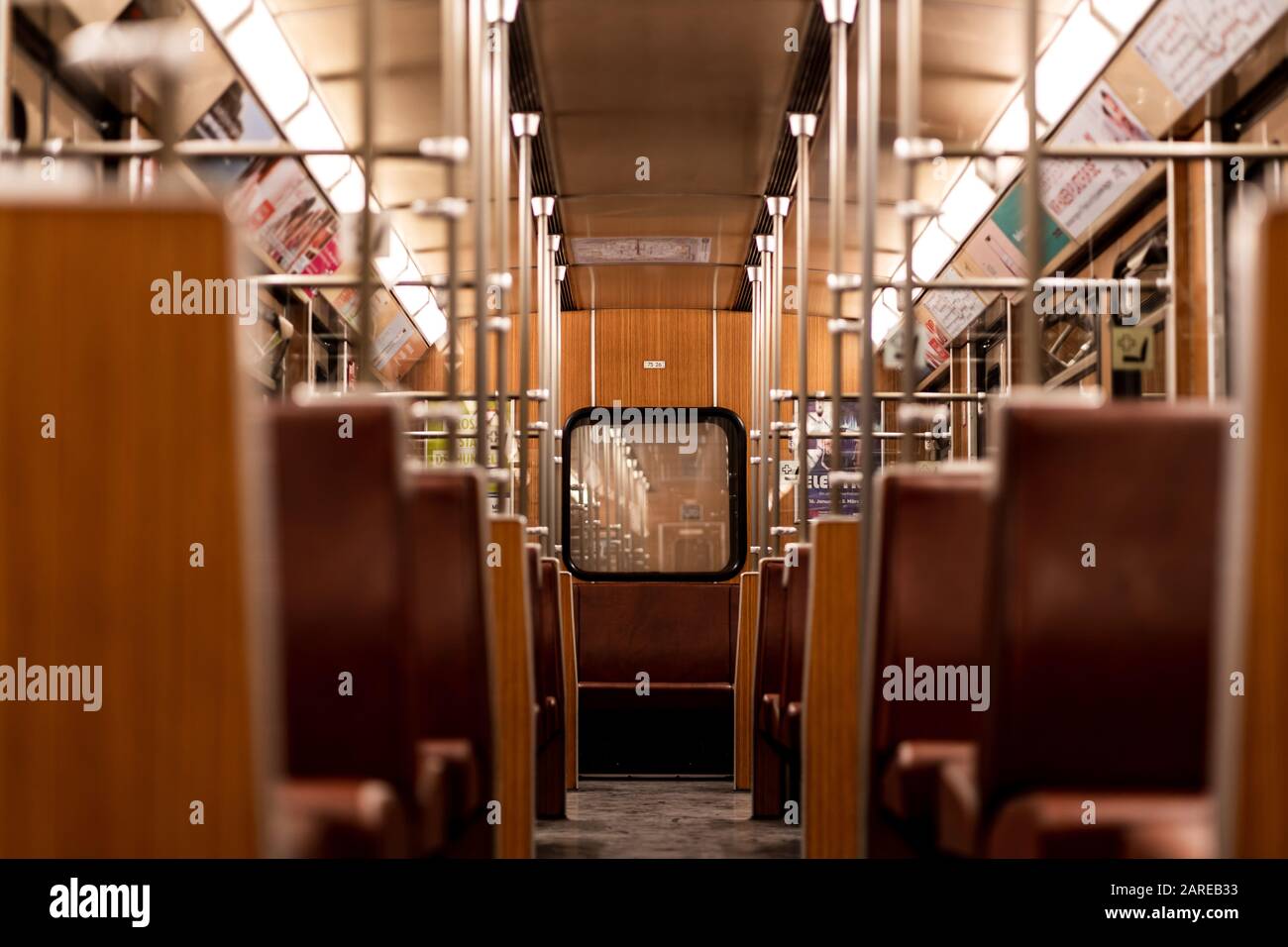 MUNICH, GERMANY - Jan 25, 2020: Interior of old vintage subway trains in Munich. Bavarian people commuting daily with these trains. Empty subway train Stock Photo