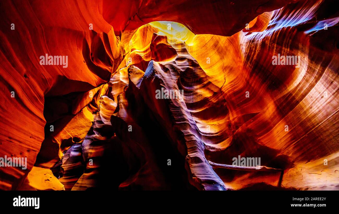 The smooth curved Red Navajo Sandstone walls of the Upper Antelope Canyon, one of the famous Slot Canyons in the Navajo lands near Page Arizona, USA Stock Photo