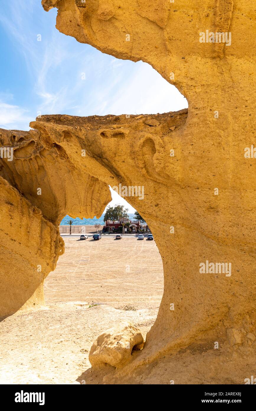 Las Gredas de Bolnuevo, also called Ciudad Encantada, are heavily eroded sandstone formations along the beach of Bolnuevo, Murcia, Spain. Seafront Stock Photo