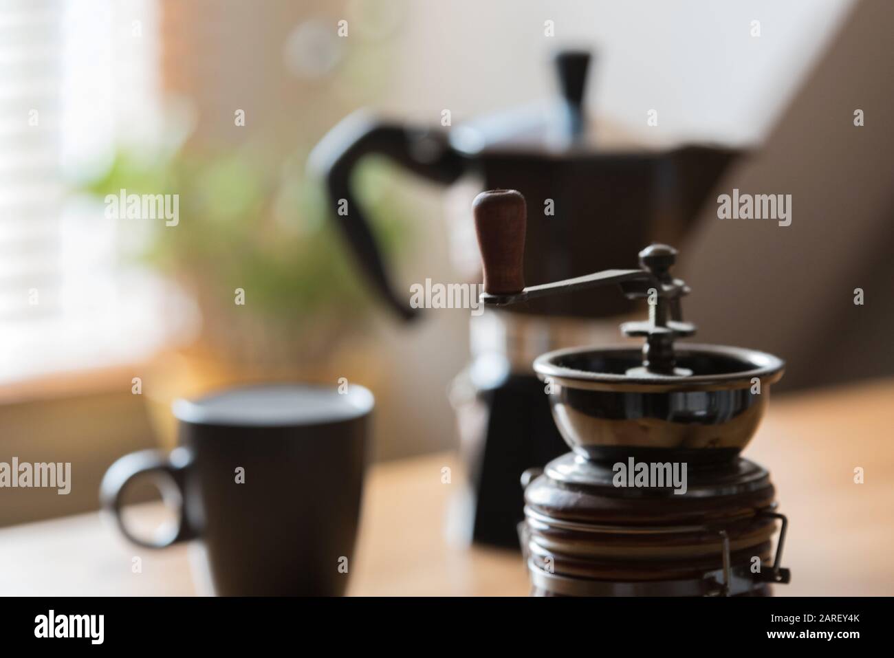 Coffee grinder and cup Stock Photo Alamy