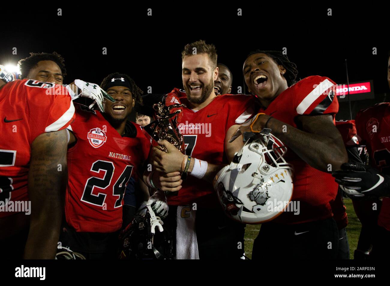 National team quarterback Nick Tiano (7) from UT-Chattanooga smiles with teammates after winning the NFLPA Collegiate Bowl MVP trophy in a game played on January 18, 2020 at the Rose Bowl in Pasadena, California. (Photo by IOS/ESPA-Images) Stock Photo